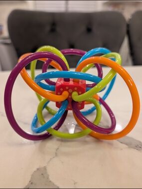 Manhattan Baby Teether & Sensory Toy - Purple, Blue, Green, Orange